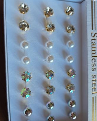 60 paia di orecchini silver  gold