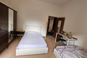 Bed space in a double room