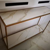 Consolle oro e calacatta