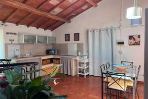 Ampio quadrilocale con giardino e posto auto