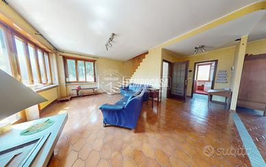 PROZIONE DI BIFAMILIARE CON GIARDINO.