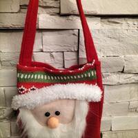 Piccola borsa rossa con Babbo Natale 