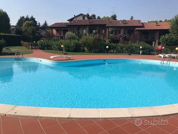 Bilocale con piscina