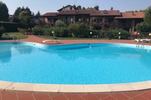 Bilocale con piscina