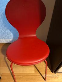 Coppia di sedie rosse, in legno e seduta ecopelle