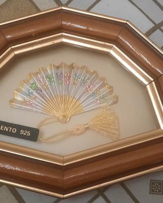 Quadretto on legno ed argento con ventaglio.