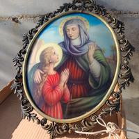 cornice vintage con quadro devozionale con luce