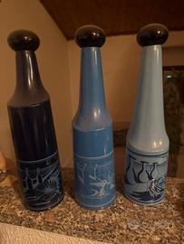 Trittico bottiglie dali