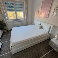 Letto matrimoniale in legno con cassettoni