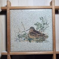 Piastrella decorativa con cornice in legno