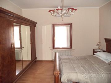 Stanza con bagno e cucina in comune a Campoformido