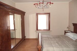 Stanza con bagno e cucina in comune a Campoformido