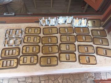 placche interruttori Mandelli in ottone, vintage