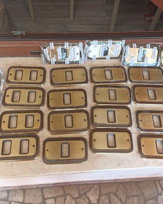 placche interruttori Mandelli in ottone, vintage