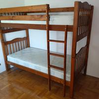 Letto a castello con toghe e materassi