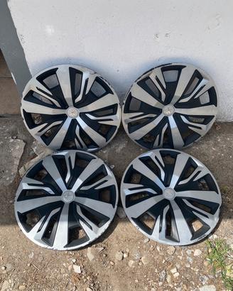 Peugeot 208 - copri cerchi - borchie