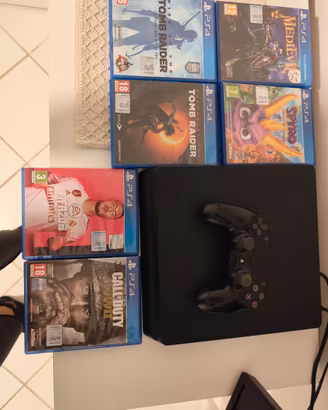 Play station 4 1tb con joystick e giochi