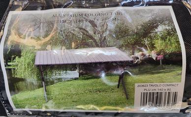 Tavolo con piano arrotolabile in alluminio