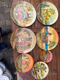 7 piatti colorati a mano