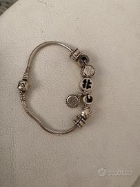 Bracciale Pandora Moments argento con 7 charm