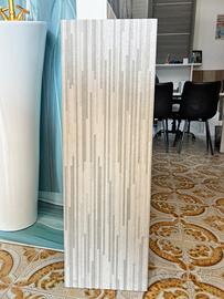 PIASTRELLA DA RIVESTIMENTO DECORO 28X85 GRIGIO