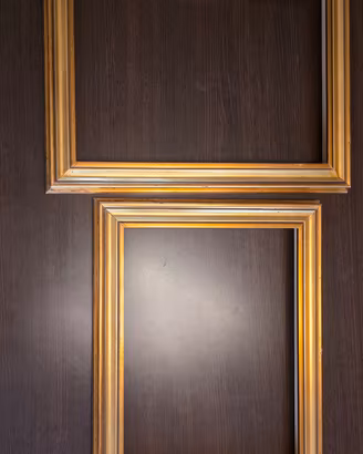 Coppia di cornici vintage dorate in legno