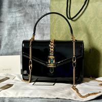 Gucci Sylvie nera in vernice