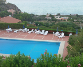 Villetta vista mare in residence con piscina