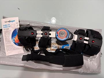 Tutore articolato di gomito ambidestro regolabile