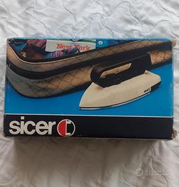 Ferro da stiro da viaggio Sicer manico pieghevole