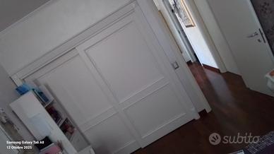 Cabina armadio  su misura con ante scorrevoli 