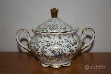 zuccheriera in porcellana con decorazioni in oro