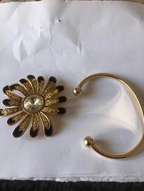 Set meravigliosa spilla e braccialetto dorati