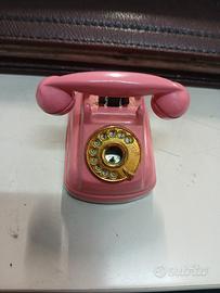 Accendino vintage a forma di telefono rosa anni 60