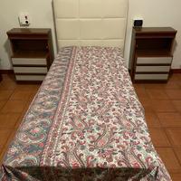 Letto singolo con testata