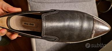 Scarpe basse Miu Miu con punta in metallo