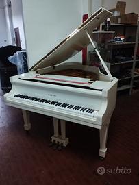 pianoforte a coda bianco