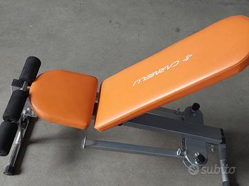 Panca addominali o pesi palestra