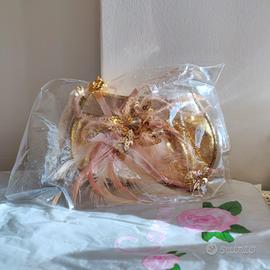 Pochette dorata Camomilla Nuova