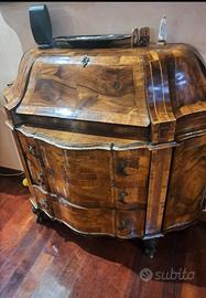 mobile e orologio a pendolo