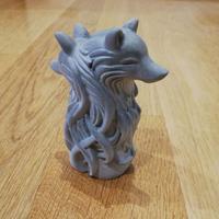 scultura con coppia di lupi