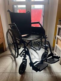 Carrozzina per persone con disabilità