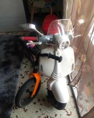 Vespa e bici senza pedali