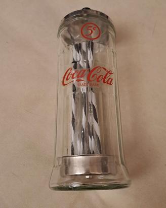 Dispenser vintage per cannucce firmato Coca-Cola.