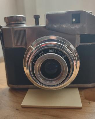 macchina fotografica antica, funzionante 