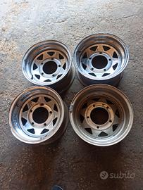 4 cerchi cromati da 14" 5 fori