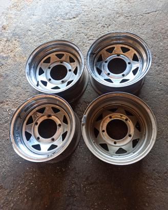 4 cerchi cromati da 14" 5 fori