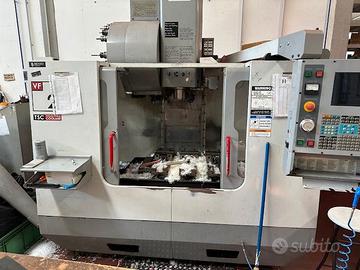 CENTRO DI LAVORO CNC HASS VF 2 anno 2003