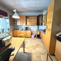 APPARTAMENTO AL PIANO TERRA CON GIARDINO, GARAGE E