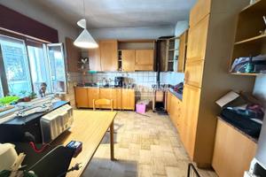 APPARTAMENTO AL PIANO TERRA CON GIARDINO, GARAGE E